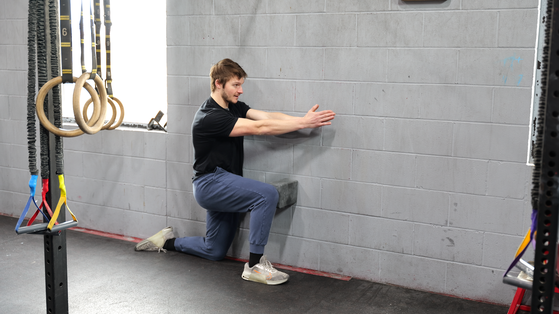 Athlete working through mobility testing and training protocols